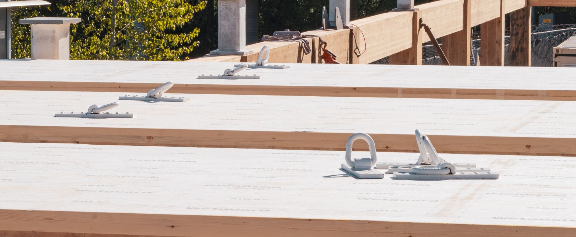 MTC's Yoke XL rigging devices being installed on CLT panels